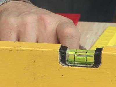 A plastic tubular bubble level vial in a instrument.